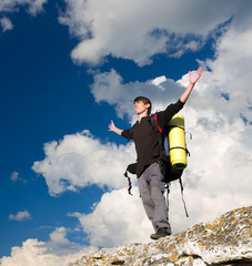 Canvas Print - Man on top of mountain.