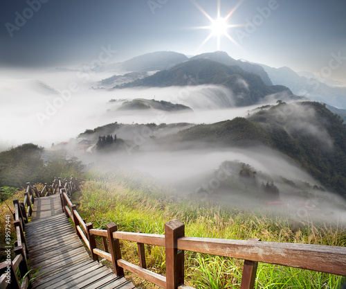 Obraz w ramie Dramatic clouds with mountain and tree