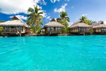 Wall Mural - Over water bungalows with steps into amazing lagoon