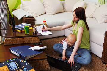 working mom with baby