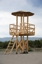Wooden Life Guard Tower At The Sandy Beach