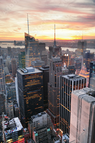 Plakat na papierze fotorealistycznym Zachód słońca na Manhattanie