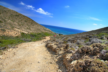 dirt road on a mountain slope. Greece. Rhodes..