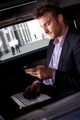 Poster - Smart businessman working in automobile