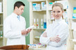 © Kadmy - Two Pharmacy chemist workers in drugstore