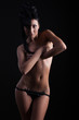 © putilov_denis - Young beautiful girl naked isolated on a black background