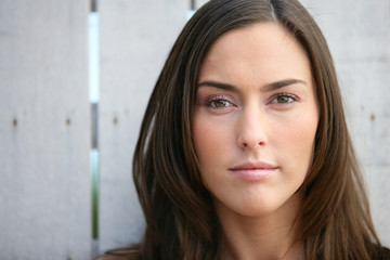 Closeup of a young woman with long brown hair