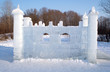 Toy ice castle in winter forest