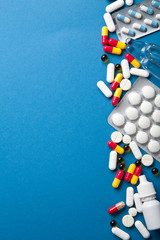 Wall Mural - pills border over blue