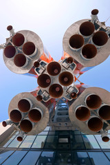 Wall Mural - details of space rocket engine over blue sky background