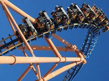 Moving Roller Coaster With Blue Sky