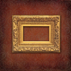 Wall Mural - Vintage mockup, golden baroque frame on a red damask vintage texture