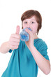 © Katarzyna Leszczynsk - Young boy drinks water from bottle isolated on white background