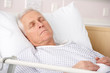 © Monkey Business - Senior man asleep in hospital bed