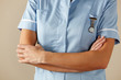 © Monkey Business - UK nurse standing with arms folded