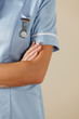 © Monkey Business - UK nurse standing with arms folded