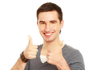 A smiling man showing thumb up sign