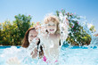 © Sunny studio - Child with mother in swimming pool
