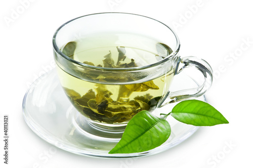 Tapeta ścienna na wymiar Cup with green tea and green leaves.