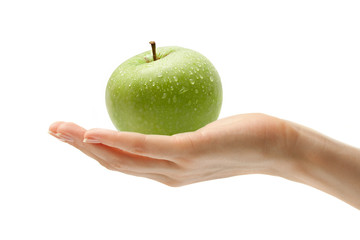 Wall Mural - Female hand with an apple