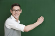 © Fotograf Daniel Mock - Happy smile from Teacher on the blackboard.