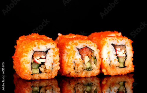 Naklejka dekoracyjna delicious sushi on black background