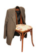 © Alex_Po - Green jacket hangs on a chair
