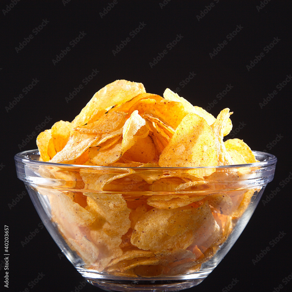 Stock-Foto „Chips in der Glas Schale Nahaufnahme“