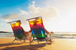 © EpicStockMedia - Happy Romantic Couple Enjoying Beautiful Sunset at the Beach