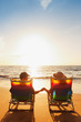 © EpicStockMedia - Happy Romantic Couple Enjoying Beautiful Sunset at the Beach