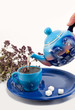 © Svetlaya - Tea and oregano in a blue service