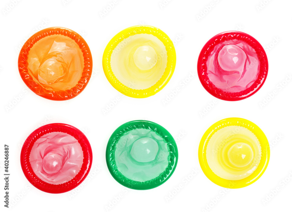 Colorful condoms isolated on white
