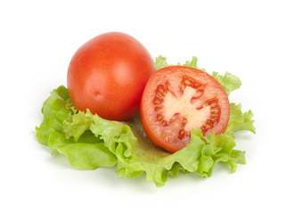 Wall Mural - Fresh tomatoes with lettuce leaf