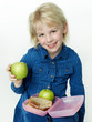 © Karin & Uwe Annas - Cute pupil shows her sandwich eaten during break