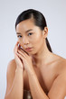 © Allen Penton - Pretty Asian woman with hands by face