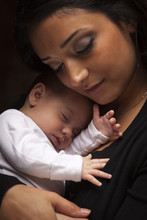 Attractive Ethnic Woman With Her Newborn Baby