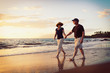 © EpicStockMedia - Senior Couple Enjoying Sunset at the Beach