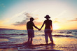 © EpicStockMedia - Senior Couple Enjoying Sunset at the Beach