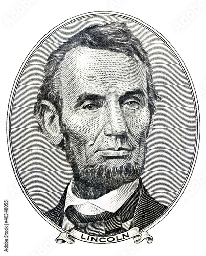 Photographie president Abraham Lincoln as he looks on five dollar bill