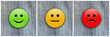 © J.J.Brown - Smile / frown badges on denim