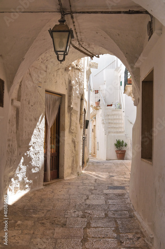 Naklejka na szybę Alleyway. Cisternino. Puglia. Italy.