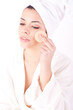 © Trendsetter Images - beautiful woman with perfect skin - Applying clean sponge.