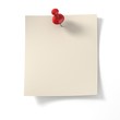 note pad pinned on white background