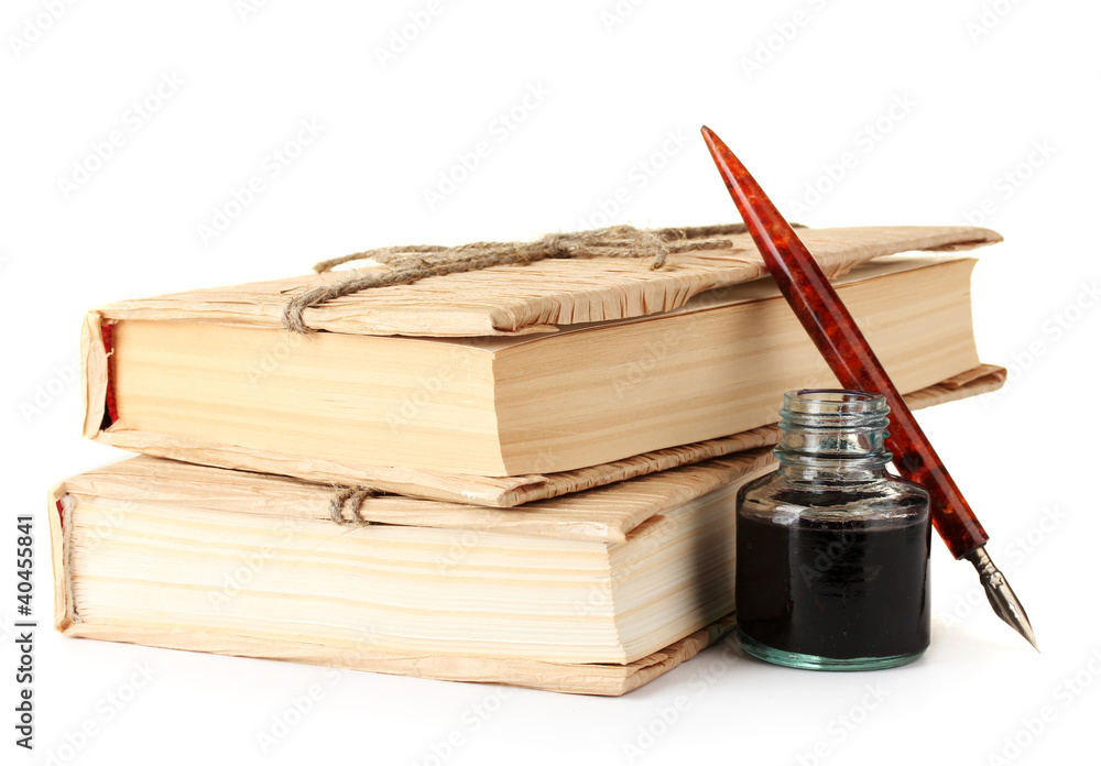 old books, ink pen and ink bottle isolated on white