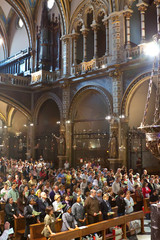 Worshipers during worship in catholic church