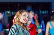 © Kzenon - Party people dancing in disco or club
