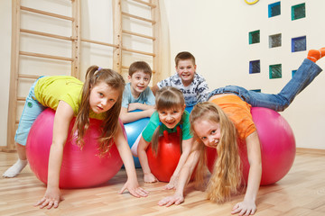 Wall Mural - Kids on  gymnastic balls