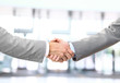 © ASDF - handshake isolated on business background
