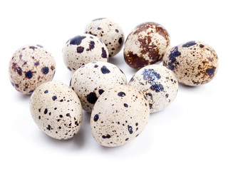 Wall Mural - Quail eggs isolated on white