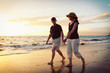 © EpicStockMedia - Senior Couple Enjoying Sunset at the Beach